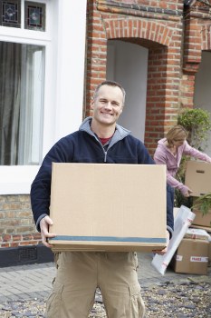 Removal van in Chelsea with recyclable moving boxes and sorted waste