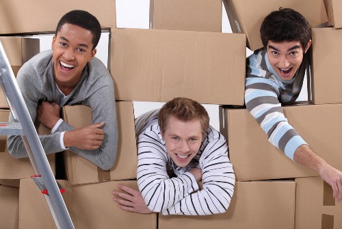 Packed boxes and furniture ready for house removals in Chelsea