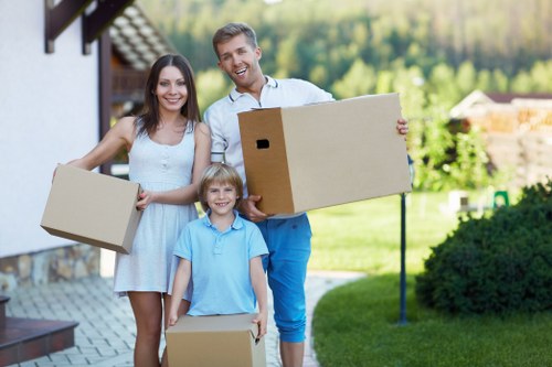 Removal team preparing a Chelsea flat move in a residential street