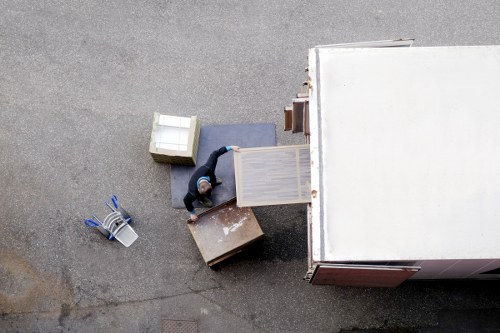Staff keeping a property walkway clear during a move