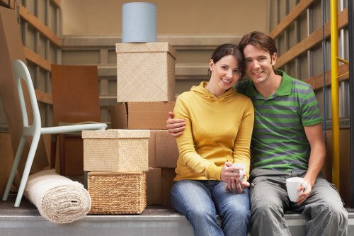 Chelsea removalists carrying furniture through a residential property