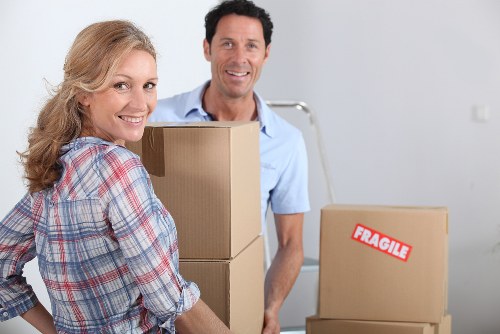 Careful packing and transport of office equipment during a Chelsea commercial move