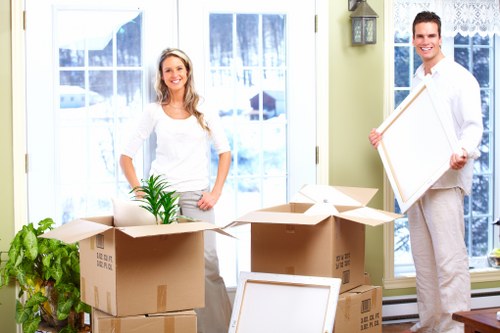 Staff reviewing a removal van complaint and service details