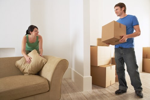Moving team handling boxes during a relocation service